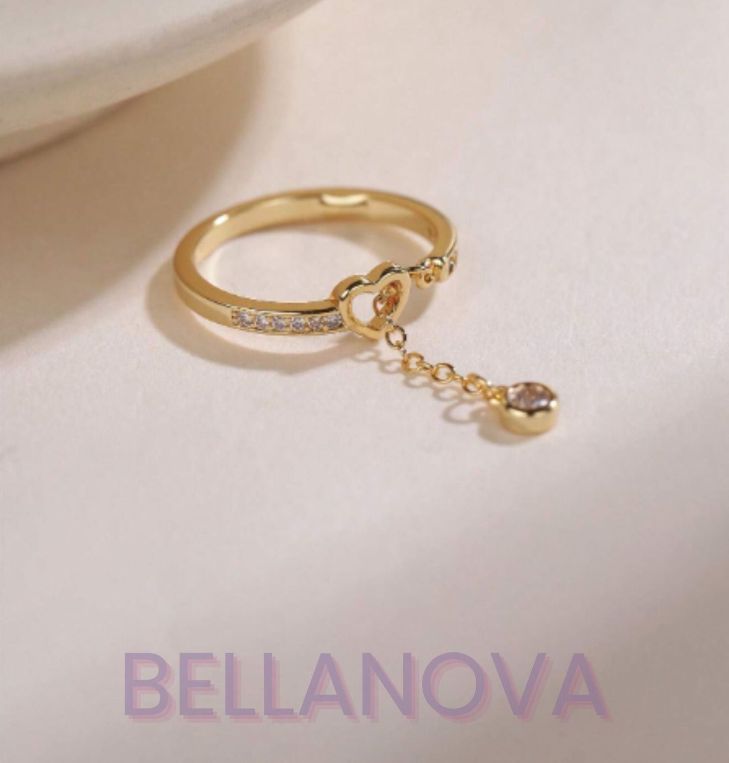 OLIVIA PADANO X BELLA NOVA | Anel Coração Ponto Luz Swarovski - Folheado a Ouro 24k+ FRETE GRÁTIS